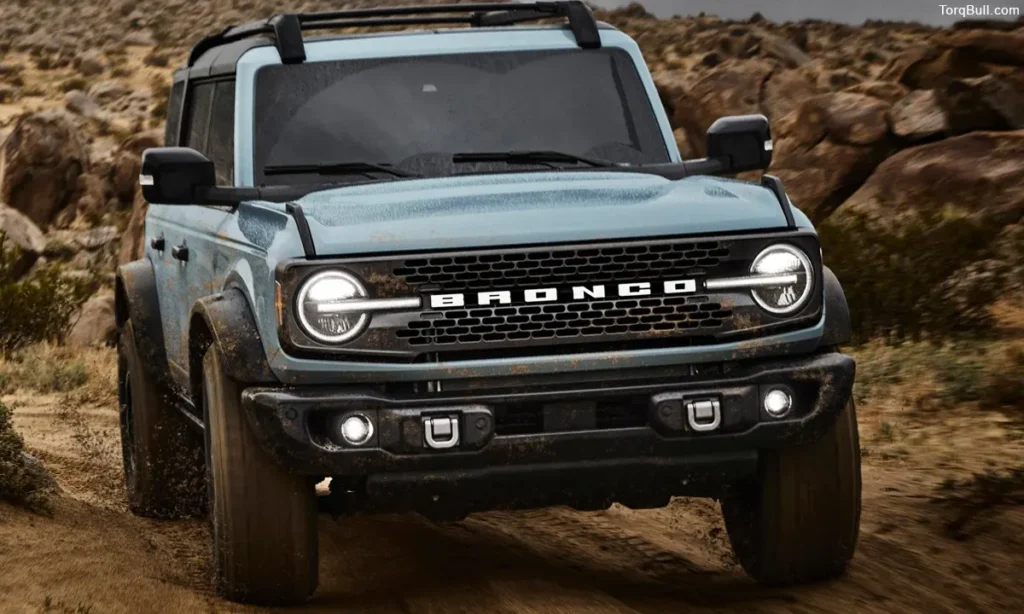 Ford Bronco driving in rough terrain 3489754723