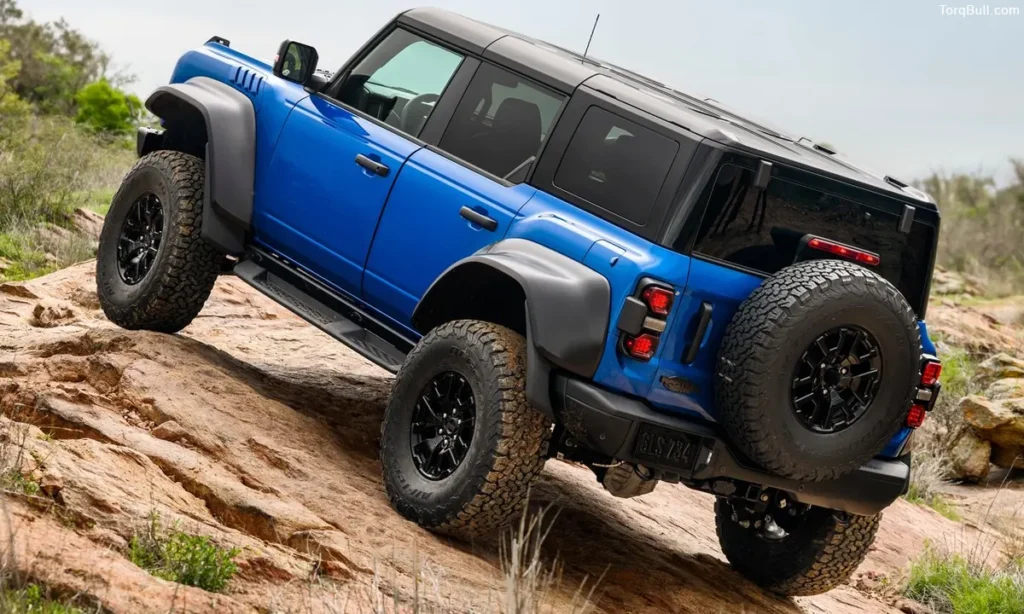 Ford Bronco Raptor off roading in rough terrain