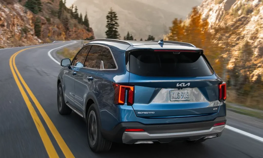 Kia Sorento Plug-In Hybrid rear profile on mountain road