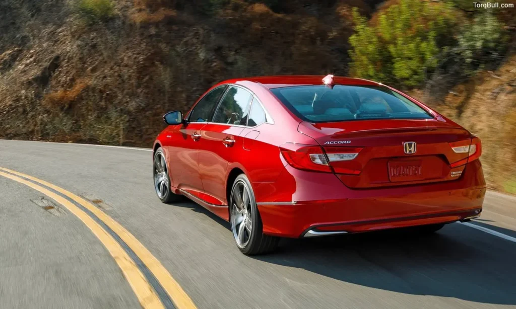 Honda Accord rear view on mountain 394857