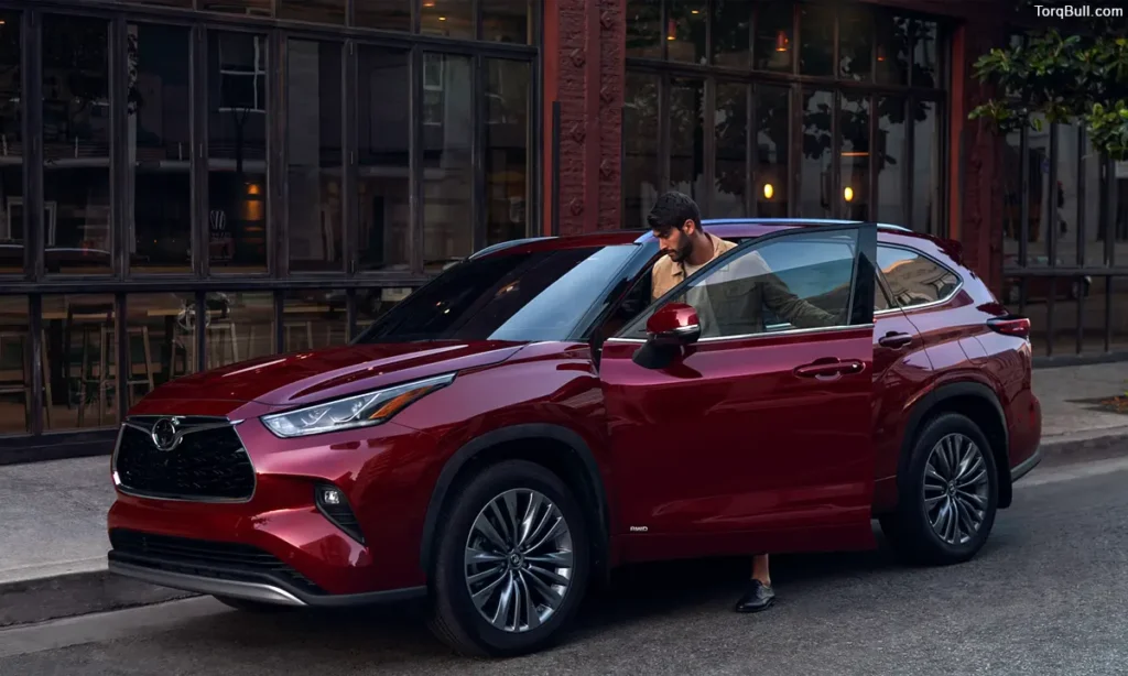 Man Sitting into Toyota Highlander
