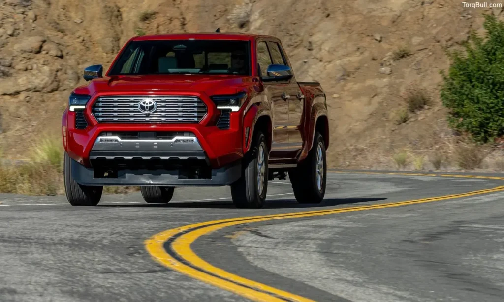 Red Toyota Tacoma on road 23490857