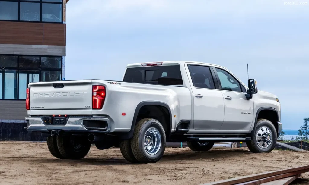 Chevrolet Silverado side rear view outside house