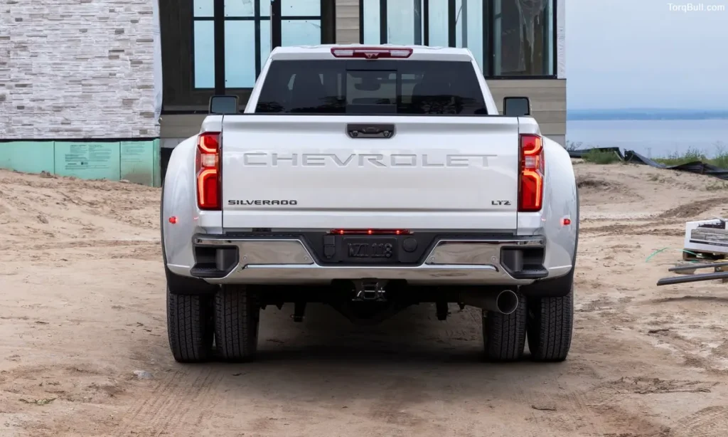 Chevrolet Silverado back view near house