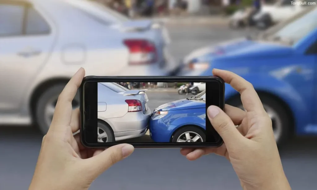 Car Accident Taking Photograph
