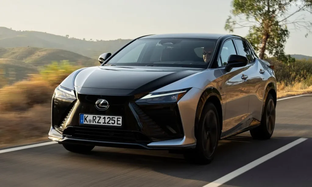 Lexus RZ running on road near mountain 4567