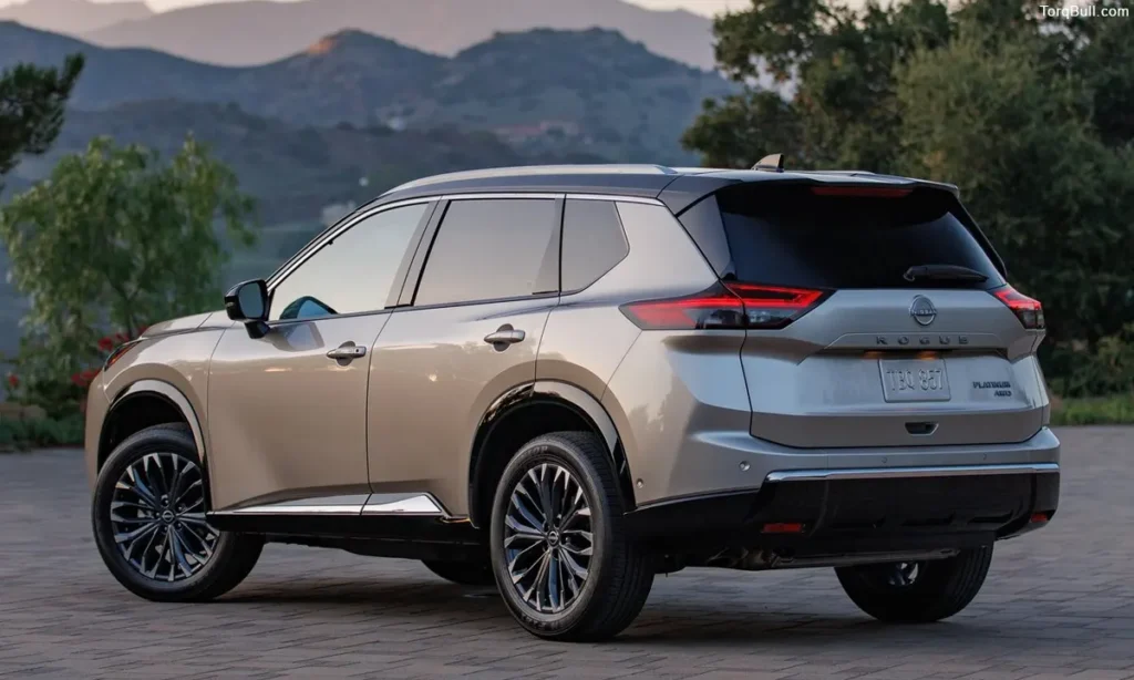 Nissan Rogue rear view near mountain
