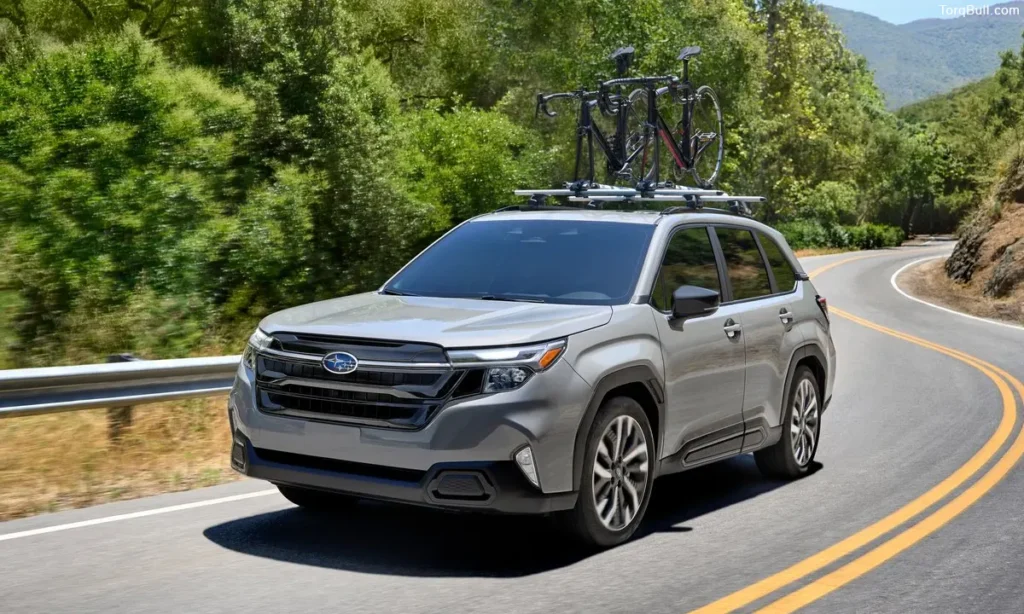 Subaru Forester on highway carrying a bike on the roof