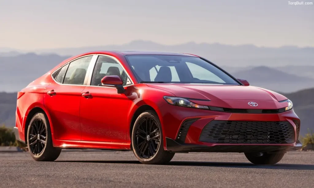 Red Toyota Camry front view parking