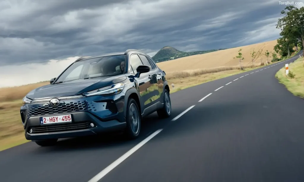 Toyota Corolla Cross running on highway daylight