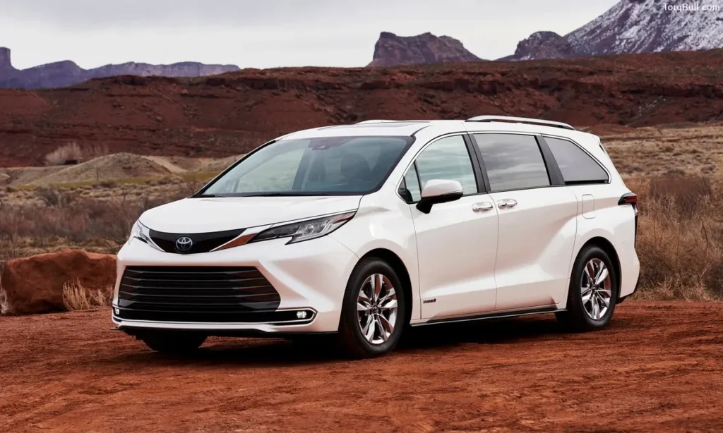 Toyota Sienna front view on hills