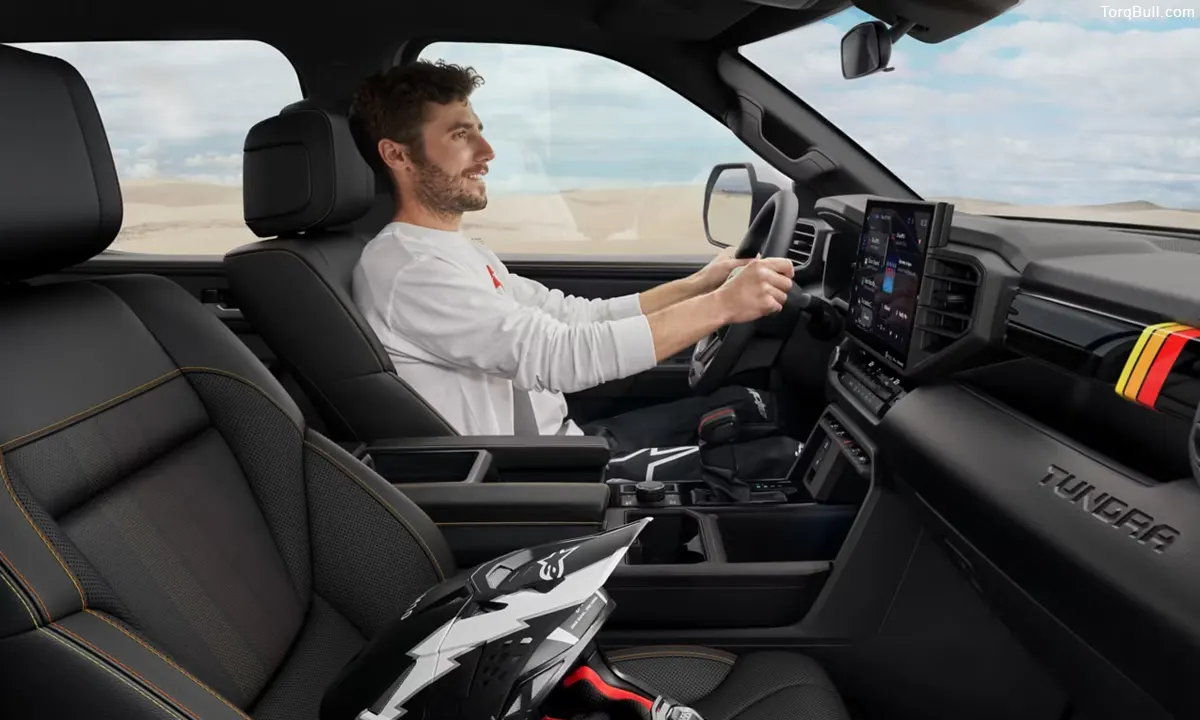 A man driving Toyota Tundra