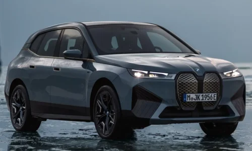 Photo: BMW Porsche Cayenne Electric vs BMW iX M60 Performance Luxury Face-Off